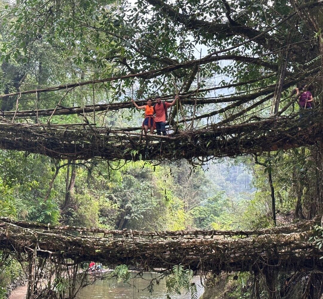 Trek to Nongriat Village-couple at double decker root bridge