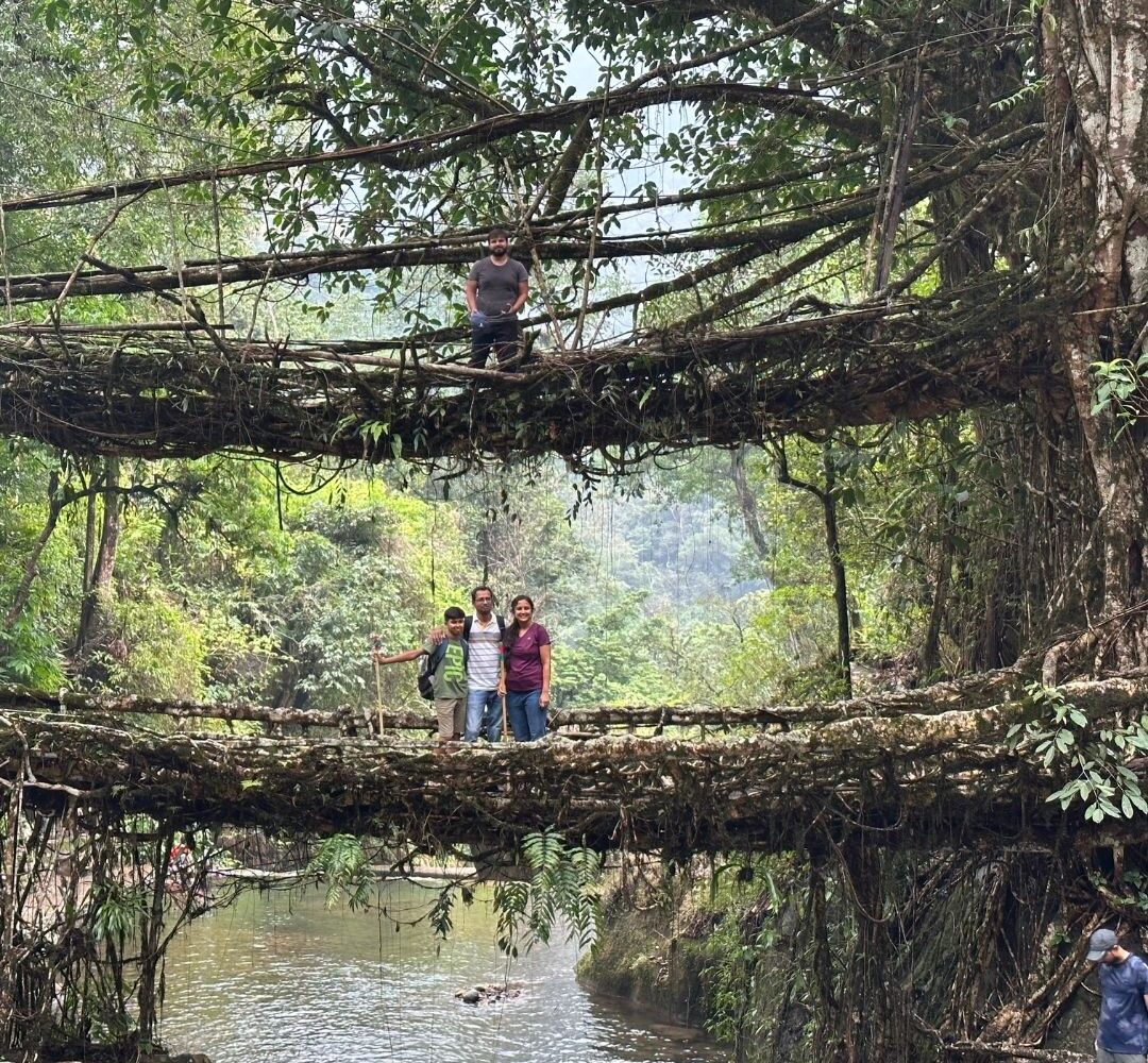 Trek to Nongriat Village-family at double decker root bridge