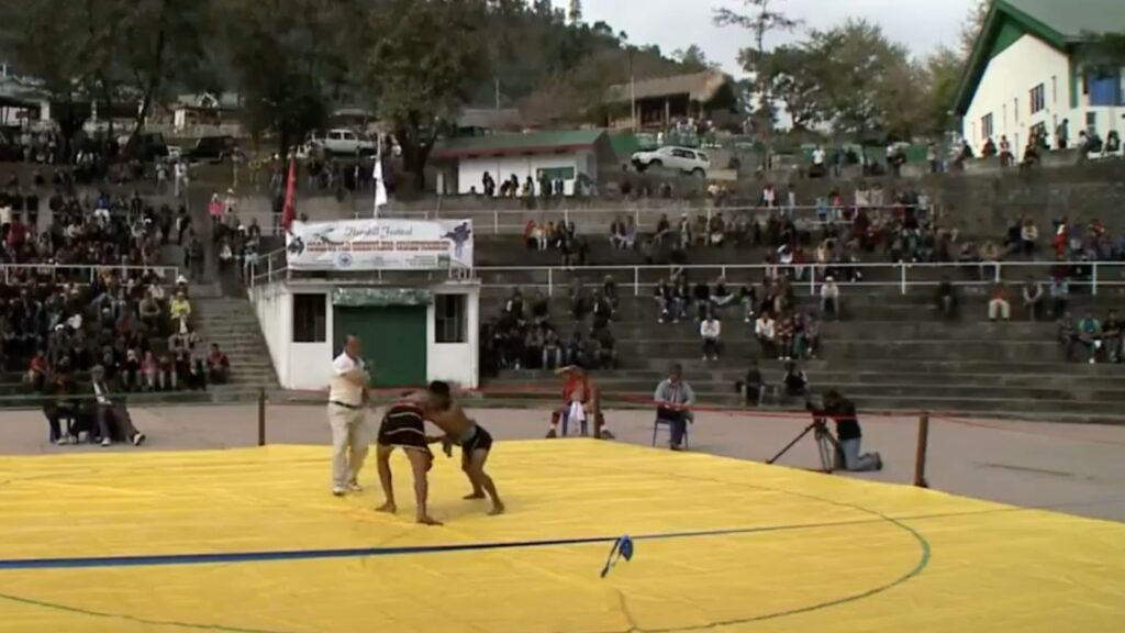Naga wrestling match in outdoor arena