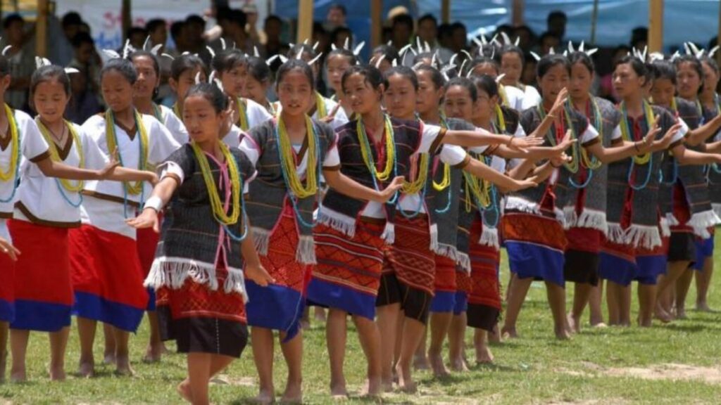 Group of women performing traditional dance.
