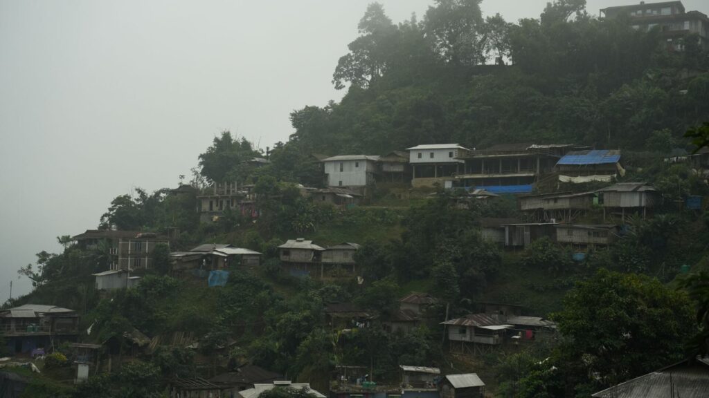 Hillside settlement in foggy weather