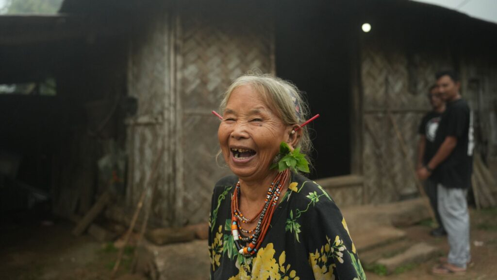Apatani woman wearing beads and ear ornaments