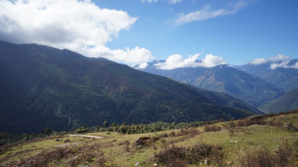 Panoramic view of forested mountains and valleys in the Eastern Himalayas