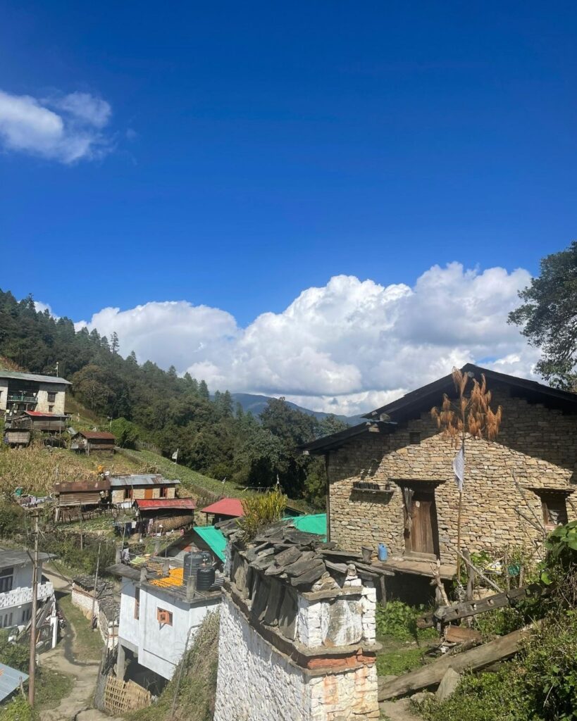Stone houses and narrow pathway inside Himalayan mountain village