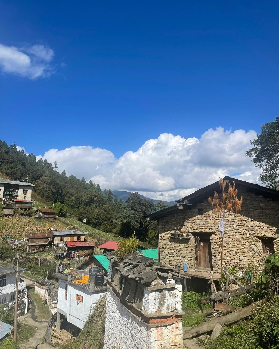 Stone houses and narrow pathway inside Himalayan mountain village