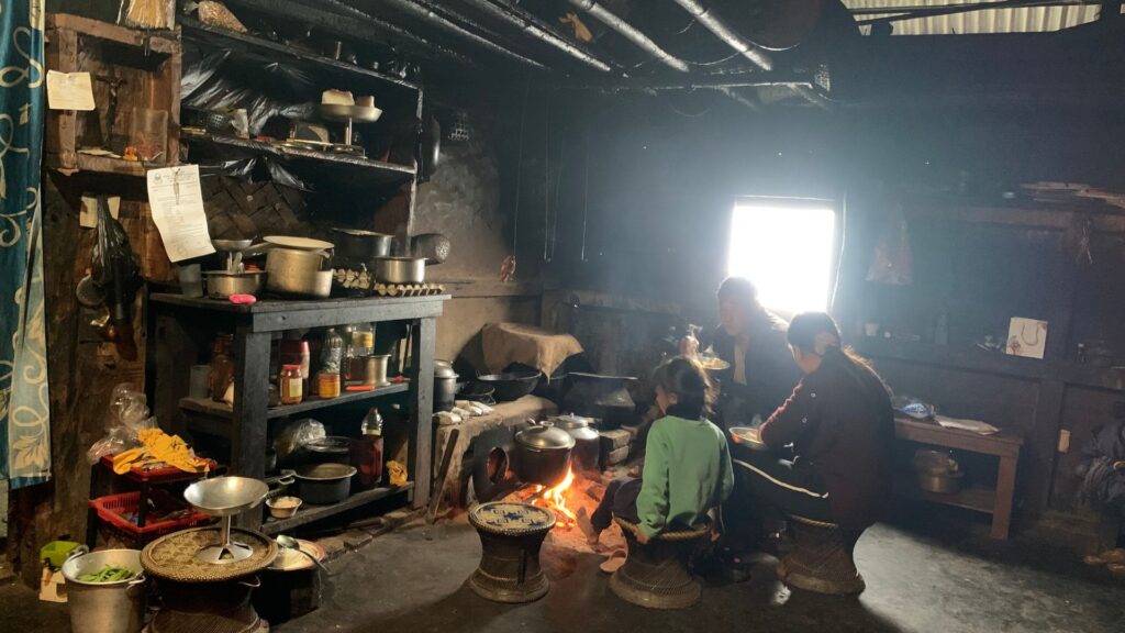 Family cooking over hearth