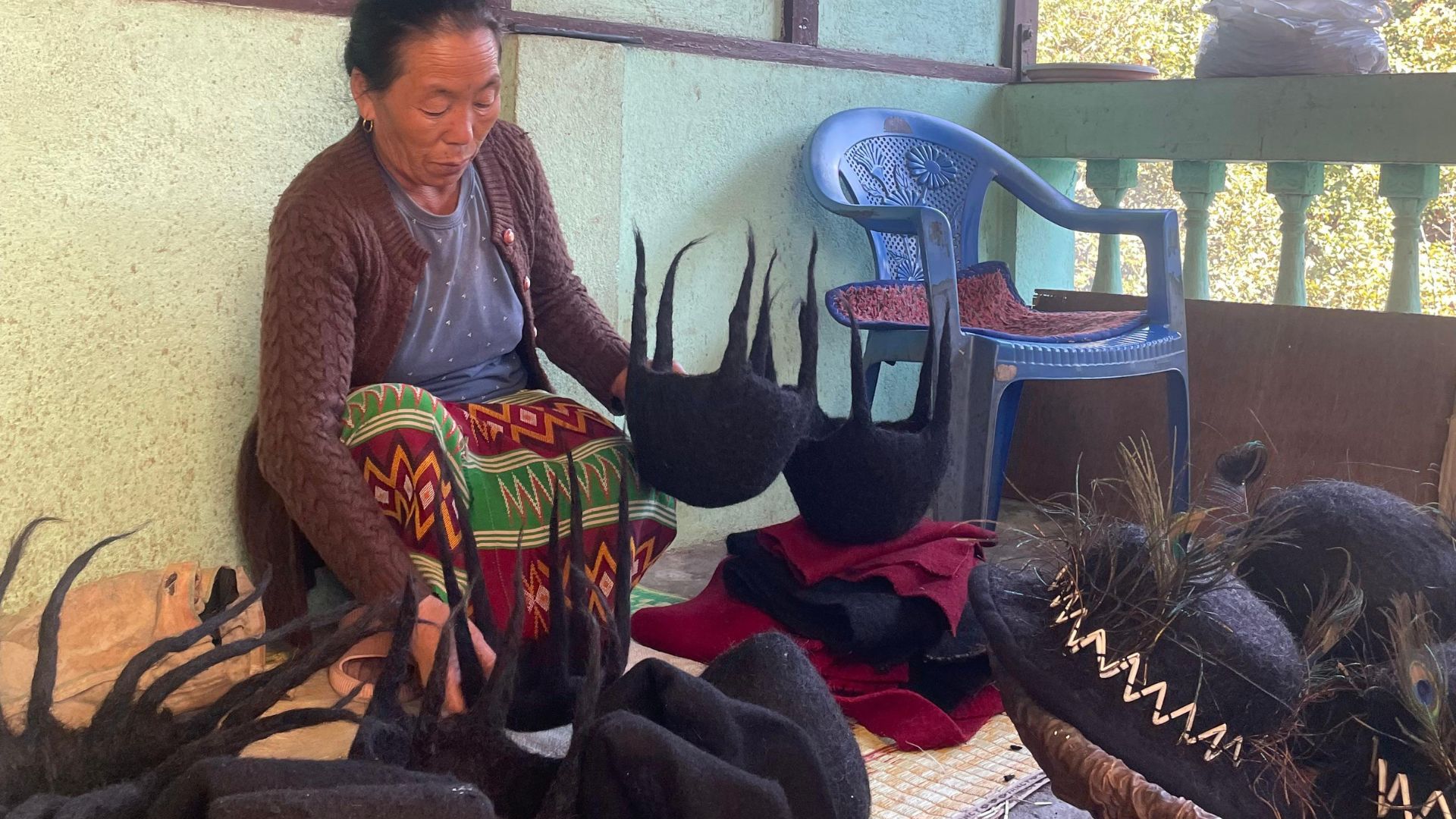 Lady with traditional Yak hair hats